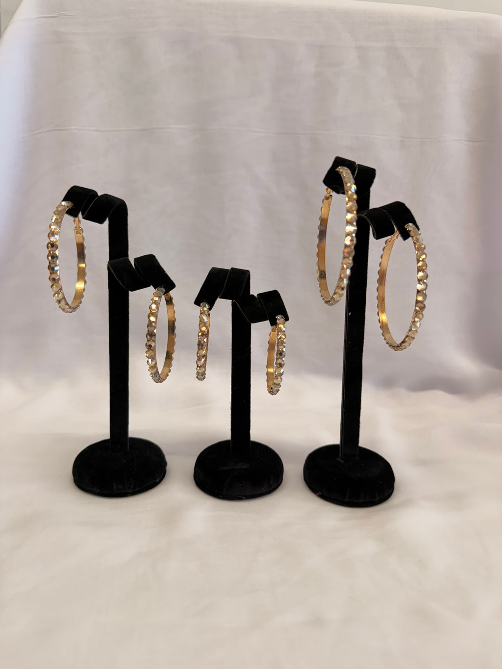 Aurora Collection Skinny Hoop earrings in Golden Crystal featuring high-intensity rhinestones on a gold-tone band.